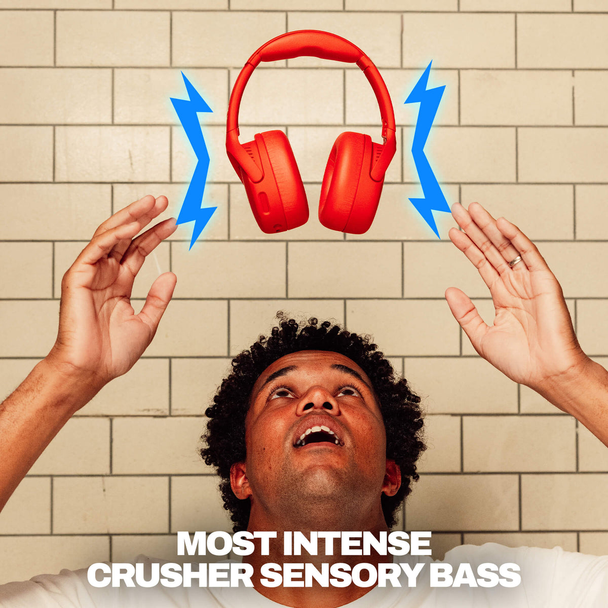 Plasma | Person with red headphones and blue lightning bolts against a tiled wall, with 'Crusher Sensory Bass' text.